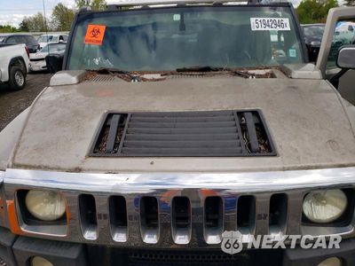 Zdjęcie 12 z 13 samochodu: 2004 HUMMER H2 VIN:5GRGN23U64H118618 - miniatura