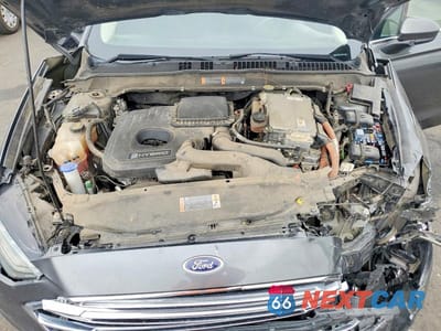 Zdjęcie 11 z 13 samochodu: 2017 FORD FUSION SE HYBRID VIN:3FA6P0LU5HR164835 - miniatura