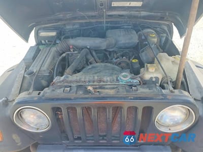 Zdjęcie 11 z 11 samochodu: 1997 JEEP WRANGLER / TJ SE VIN:1J4FY29P0VP438623 - miniatura