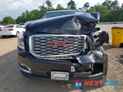 Piąte zdjęcie samochodu w środku: 2019 GMC YUKON DENALI VIN:1GKS1CKJ1KR225978 - miniatura