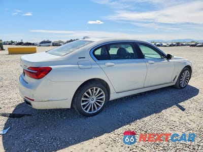 Trzecie zdjęcie samochodu z tyłu: 2018 BMW 740 XE VIN:WBA7J2C58JG938168 - miniatura