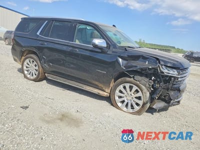 Czwarte zdjęcie samochodu z boku: 2024 CHEVROLET TAHOE K1500 PREMIER VIN:1GNSKSKD6RR299718 - miniatura