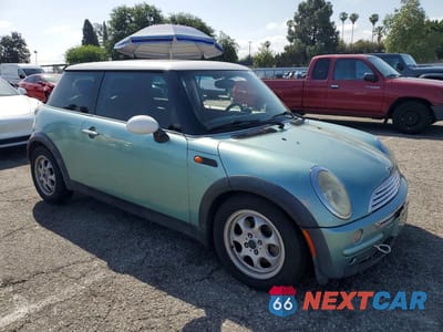Czwarte zdjęcie samochodu z boku: 2003 MINI COOPER VIN:WMWRC33423TE15662 - miniatura