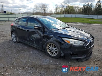 Czwarte zdjęcie samochodu z boku: 2015 FORD FOCUS SE VIN:1FADP3K2XFL202967 - miniatura