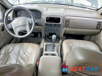 Zdjęcie 8 z 13 samochodu: 2001 JEEP GRAND CHEROKEE LAREDO VIN:1J4GX48S51C657149 - miniatura