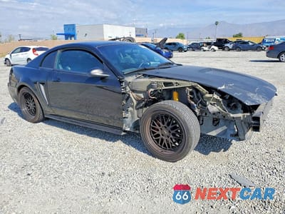 Czwarte zdjęcie samochodu z boku: 2000 FORD MUSTANG GT VIN:1FAFP42X1YF201055 - miniatura