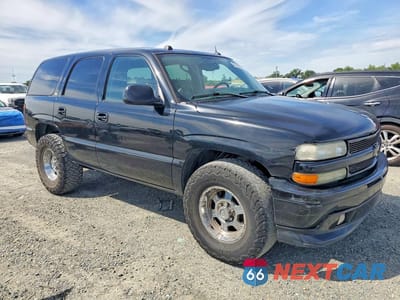 Czwarte zdjęcie samochodu z boku: 2005 CHEVROLET TAHOE C1500 VIN:1GNEC13T75R202823 - miniatura