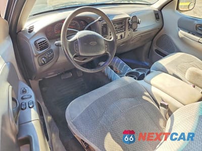 Zdjęcie 8 z 12 samochodu: 1999 FORD F150 VIN:2FTRX08W1XCA16951 - miniatura