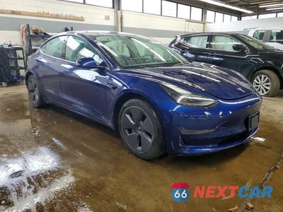 Czwarte zdjęcie samochodu z boku: 2022 TESLA MODEL 3 VIN:5YJ3E1EA8NF370370 - miniatura