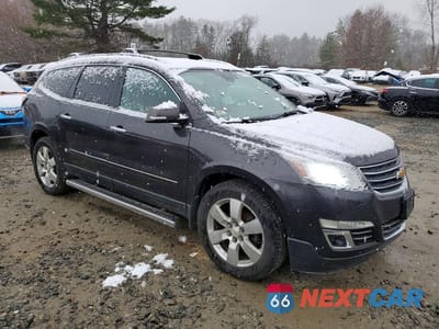 Czwarte zdjęcie samochodu z boku: 2014 CHEVROLET TRAVERSE LTZ VIN:1GNKVJKD8EJ142993 - miniatura