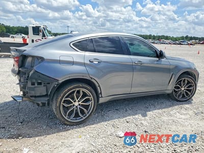 Trzecie zdjęcie samochodu z tyłu: 2019 BMW X6 SDRIVE35I VIN:5UXKU0C53K0S97822 - miniatura