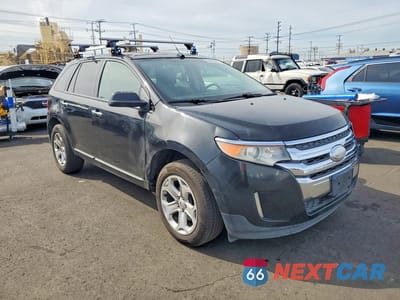 Czwarte zdjęcie samochodu z boku: 2011 FORD EDGE SEL VIN:2FMDK3JC5BBB27734 - miniatura