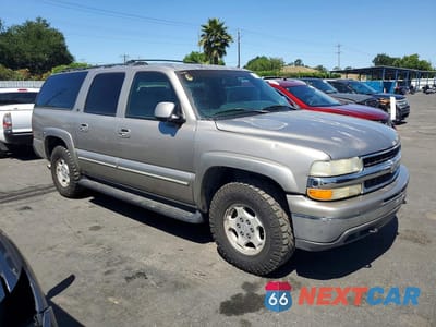 Czwarte zdjęcie samochodu z boku: 2002 CHEVROLET SUBURBAN K1500 VIN:1GNFK16T42J208091 - miniatura