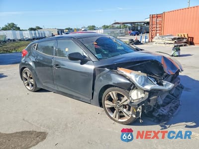 Czwarte zdjęcie samochodu z boku: 2016 HYUNDAI VELOSTER BASE VIN:KMHTC6AD4GU249022 - miniatura