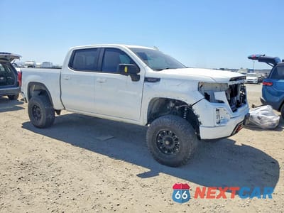 Czwarte zdjęcie samochodu z boku: 2019 GMC SIERRA K1500 AT4 VIN:3GTP9EEL9KG127459 - miniatura
