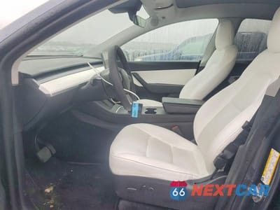 Zdjęcie 7 z 13 samochodu: 2022 TESLA MODEL Y VIN:7SAYGDEE9NF512992 - miniatura