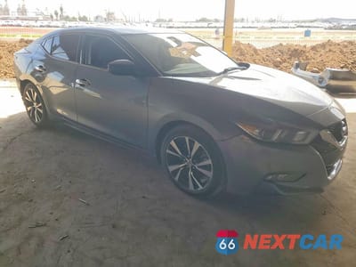 Czwarte zdjęcie samochodu z boku: 2018 NISSAN MAXIMA 3.5 S VIN:1N4AA6AP2JC395367 - miniatura