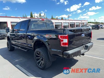 Trzecie zdjęcie samochodu z tyłu: 2019 FORD F150 SUPERCREW VIN:1FTFW1E44KFC68933 - miniatura