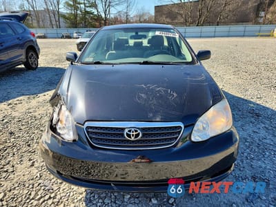 Piąte zdjęcie samochodu w środku: 2005 TOYOTA COROLLA LE VIN:2T1BR32E75C409280 - miniatura