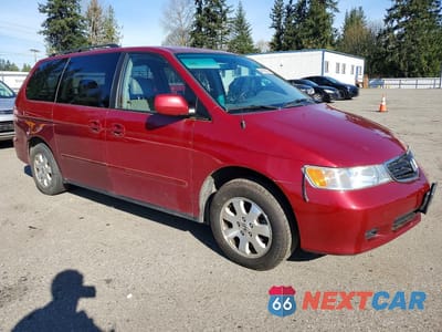 Czwarte zdjęcie samochodu z boku: 2003 HONDA ODYSSEY EXL VIN:5FNRL18983B149575 - miniatura
