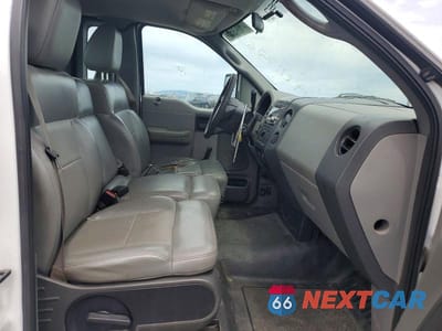Zdjęcie 10 z 12 samochodu: 2005 FORD F150 VIN:1FTRF12275NB59683 - miniatura
