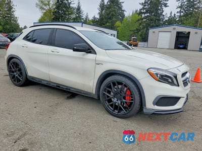 Czwarte zdjęcie samochodu z boku: 2015 MERCEDES-BENZ GLA 45 AMG VIN:WDDTG5CBXFJ077471 - miniatura