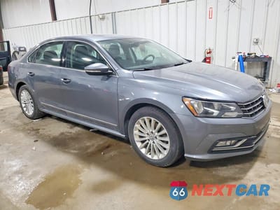 Czwarte zdjęcie samochodu z boku: 2016 VOLKSWAGEN PASSAT VIN:1VWBT7A35GC068754 - miniatura