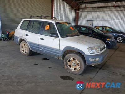 Czwarte zdjęcie samochodu z boku: 1998 TOYOTA RAV4 BASE VIN:JT3HP10V0W0170243 - miniatura