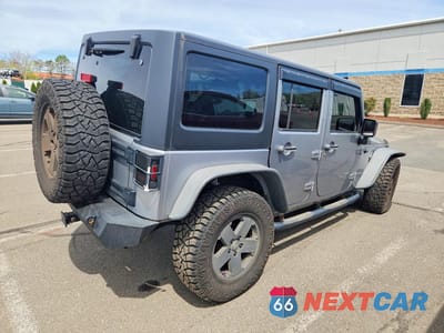 Trzecie zdjęcie samochodu z tyłu: 2017 JEEP WRANGLER UNLIMITED SPORT VIN:1C4HJWDG3HL670971 - miniatura