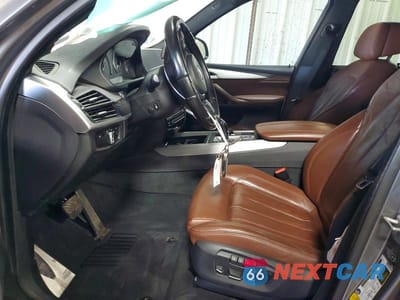 Zdjęcie 7 z 12 samochodu: 2014 BMW X5 XDRIVE50I VIN:5UXKR6C56E0J72709 - miniatura