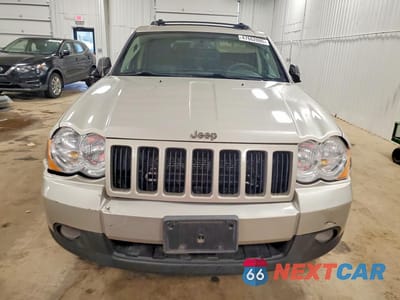 Piąte zdjęcie samochodu w środku: 2010 JEEP GRAND CHEROKEE LAREDO VIN:1J4PR4GK7AC117460 - miniatura