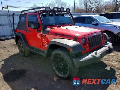 Czwarte zdjęcie samochodu z boku: 2011 JEEP WRANGLER SPORT VIN:1J4AA2D14BL627604 - miniatura