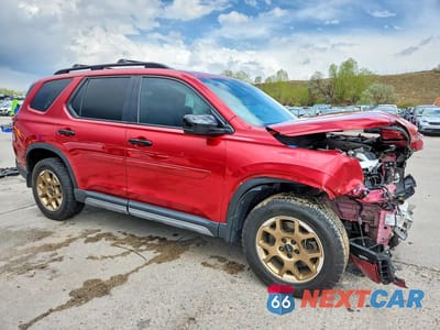 Czwarte zdjęcie samochodu z boku: 2024 HONDA PILOT TRAILSPORT VIN:5FNYG1H60RB041529 - miniatura