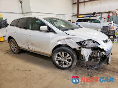 Czwarte zdjęcie samochodu z boku: 2012 MAZDA CX-7 VIN:JM3ER4C38C0422070 - miniatura