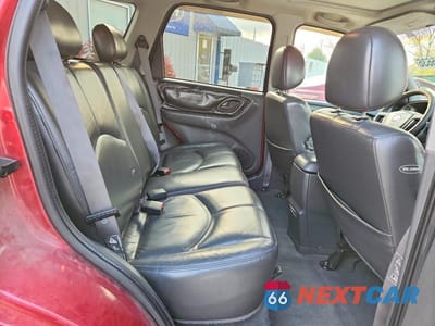 Zdjęcie 11 z 13 samochodu: 2003 MAZDA TRIBUTE ES VIN:4F2CZ06163KM45676 - miniatura