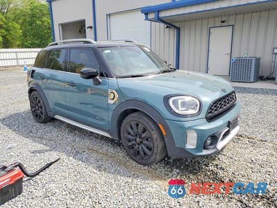 Czwarte zdjęcie samochodu z boku: 2022 MINI COOPER S E COUNTRYMAN ALL4 VIN:WMZ23BS03N3N89785 - miniatura