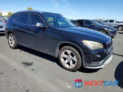 Czwarte zdjęcie samochodu z boku: 2015 BMW X1 SDRIVE28I VIN:WBAVM1C53FVZ93980 - miniatura