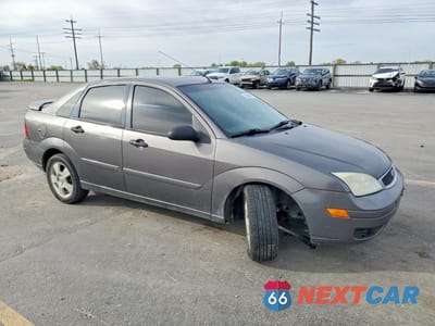 Czwarte zdjęcie samochodu z boku: 2006 FORD FOCUS ZX4 VIN:1FAFP34N16W126733 - miniatura