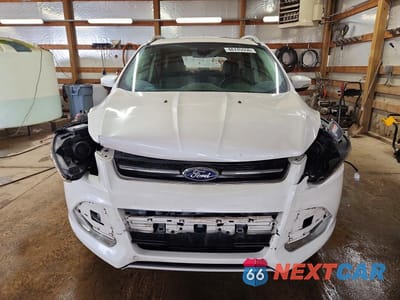 Piąte zdjęcie samochodu w środku: 2014 FORD ESCAPE TITANIUM VIN:1FMCU0J95EUB07197 - miniatura