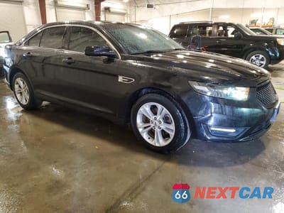 Czwarte zdjęcie samochodu z boku: 2014 FORD TAURUS SEL VIN:1FAHP2E81EG156125 - miniatura