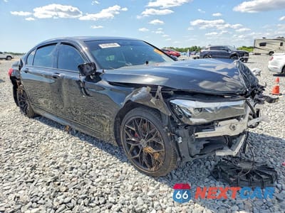 Czwarte zdjęcie samochodu z boku: 2019 BMW 740 I VIN:WBA7E2C55KB454770 - miniatura