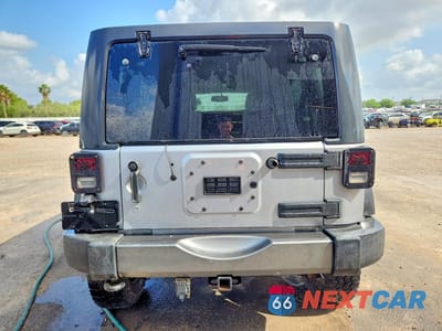 Zdjęcie 6 z 12 samochodu: 2013 JEEP WRANGLER UNLIMITED SPORT VIN:1C4BJWDG4DL628857 - miniatura
