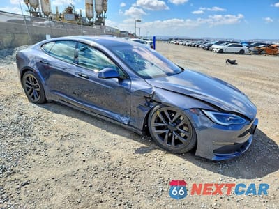 Czwarte zdjęcie samochodu z boku: 2023 TESLA MODEL S VIN:5YJSA1E50PF517598 - miniatura