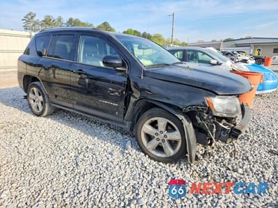 Czwarte zdjęcie samochodu z boku: 2014 JEEP COMPASS LATITUDE VIN:1C4NJCEB4ED628366 - miniatura