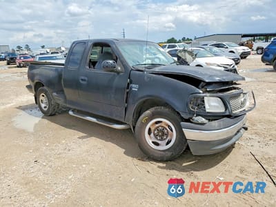Czwarte zdjęcie samochodu z boku: 1999 FORD F150 VIN:1FTRX07L2XKA58693 - miniatura