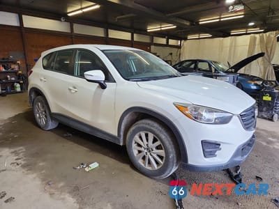 Czwarte zdjęcie samochodu z boku: 2016 MAZDA CX-5 SPORT VIN:JM3KE4BYXG0730343 - miniatura