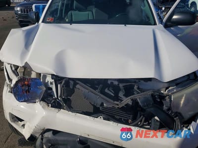 Zdjęcie 11 z 12 samochodu: 2015 TOYOTA TACOMA V6 VIN:3TMMU4FN7FM074120 - miniatura