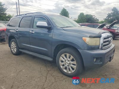 Czwarte zdjęcie samochodu z boku: 2010 TOYOTA SEQUOIA PLATINUM VIN:5TDDW5G13AS037490 - miniatura
