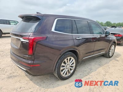Trzecie zdjęcie samochodu z tyłu: 2021 CADILLAC XT6 PREMIUM LUXURY VIN:1GYKPCRSXMZ190802 - miniatura