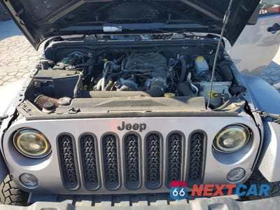 Zdjęcie 11 z 12 samochodu: 2013 JEEP WRANGLER UNLIMITED SAHARA VIN:1C4BJWEG7DL662953 - miniatura